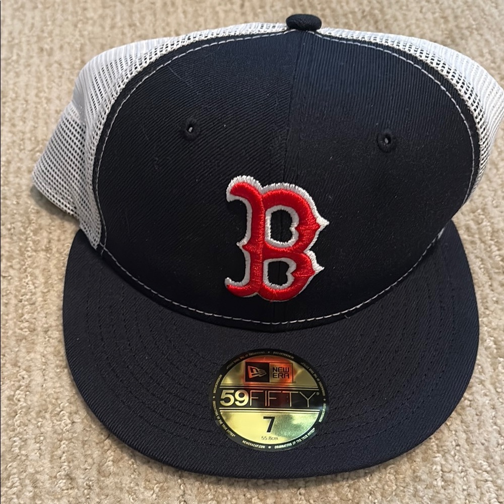 New Era Black Cap with Red Emblem